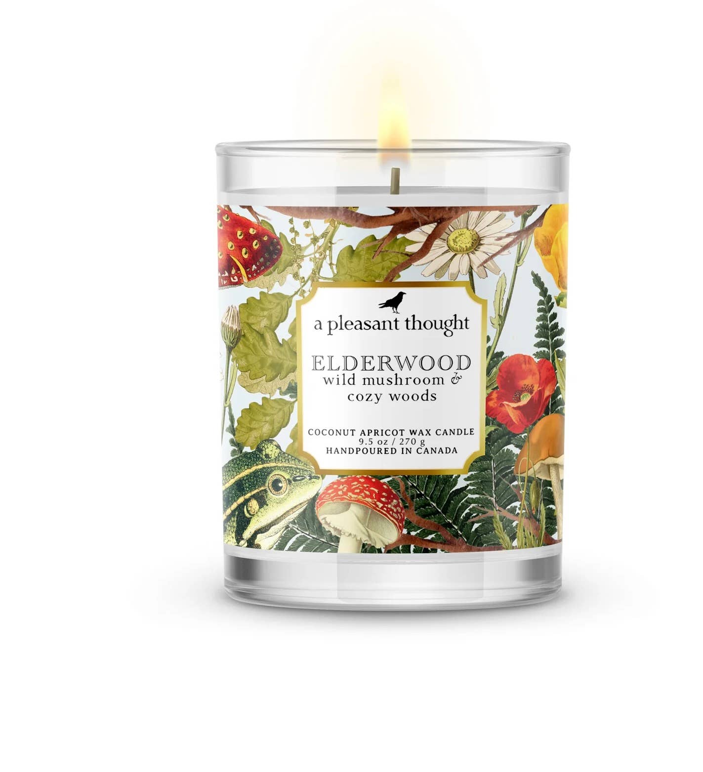 Candle with a decorative label featuring nature-themed illustrations on a white background